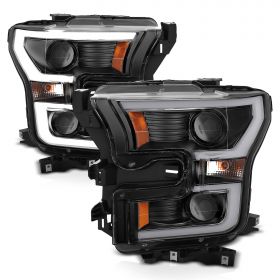 AmeriLite for 2015-2017 Ford F150 Pickup [Halogen Type] Dual LED Bar Projector Black Replacement Headlight Set - Driver and Passenger Side