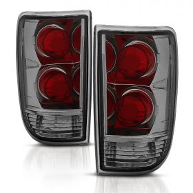AmeriLite for 1995-2005 Chevy Blazer GMC Jimmy S-10 S-15 Smoke Euro Tail Lights Aftermarket Brake Lamps Pair - Passenger and Driver Side
