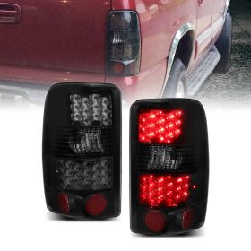 AmeriLite for 2000-2006 Chevy Tahoe/Suburban : GMC Yukon Smoke Black LED Brake Tail Lights Assembly Set - Passenger and Driver Side