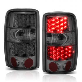 AmeriLite for 2000-2006 Chevy Tahoe/Suburban : GMC Yukon Smoke LED Brake Tail Lights Assembly Set - Passenger and Driver Side