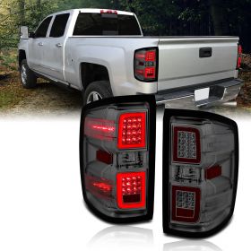AmeriLite for 2014-2018 Chevy Silverado 1500 2500 3500 GMC Sierra Smoke Lens LED Light Tube Taillights Pair - Driver and Passenger Side