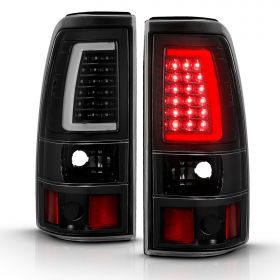 AmeriLite for 1999-2006 GMC Sierra / 99-02 Chevy Silverado Pick Up Truck Clear Black C-Type LED Tube Replacement Tail Lights Brake Lamp Set - Passenger and Driver Side