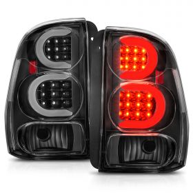 AmeriLite for 2002-2009 Chevy Trailblazer / EXT Clear Black C-Type LED Tube Tail Lights Brake Lamps Pair - Driver and Passenger Side