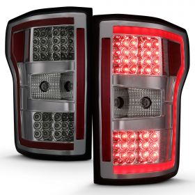 AmeriLite for 2018-2020 Ford F150 Smoke Lens Tail Lights Assembly with LED Light Bar Set - Driver and Passenger Side