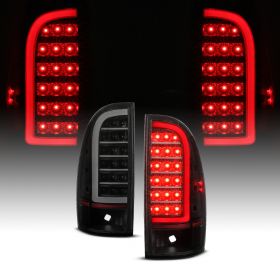AmeriLite for 2005-2015 Toyota Tacoma Truck C-Type LED Tube Smoke Black Tail Light Assembly Set - Driver and Passenger Side