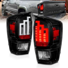 AmeriLite for 2016-2022 Toyota Tacoma Pickup Truck LED Tube Parking Lamp Clear Black Tail Lights Assembly - Driver and Passenger Side