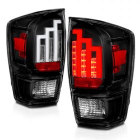 AmeriLite for 2016-2022 Toyota Tacoma Pickup Truck LED Tube Parking Lamp Clear Black Tail Lights Assembly - Driver and Passenger Side