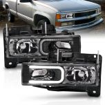 AmeriLite For Chevy C/K Tahoe Suburban SUV Fullsize Blazer GMC Yukon C-Type LED Tube Halogen Black Headlight Set - Passenger and Driver Side