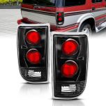 AmeriLite for 1995-2005 Chevy Blazer GMC Jimmy S-10 S-15 Black Euro Tail Lights Aftermarket Brake Lamps Pair - Passenger and Driver Side