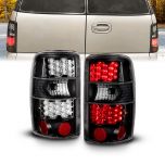 AmeriLite for 2000-2006 Chevy Tahoe/Suburban : GMC Yukon Black LED Replacement Brake Tail Lights Set - Passenger and Driver Side