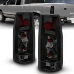 AmeriLite Black/Smoke Replacement Brake Tail Lights Set For Chevy GMC Full Size Silverado Suburban Tahoe Sierra - Passenger and Driver Side