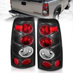 AmeriLite for 1999-2002 Chevy Silverado 99-06 GMC Sierra Altezza Black Replacement Brake Tail Lights Set - Passenger and Driver Side