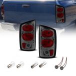 AmeriLite for 2002-2006 Dodge Ram 1500 | 03-06 Ram 2500 3500 Pickup Euro-Style Smoke Chrome Replacement Taillights Pair - Driver and Passenger Side