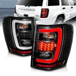 AmeriLite for 1999-2004 Jeep Grand Cherokee C-Type LED Tube Black Tail Lights Assembly Set- Passenger and Driver Side